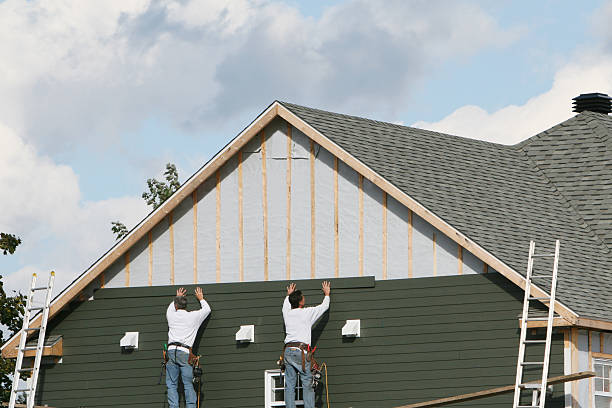 Professional Siding technician working in North, VA